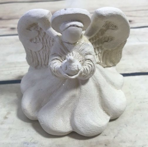 white angel candle holder