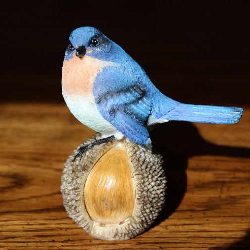 Bluebird on nut figurine